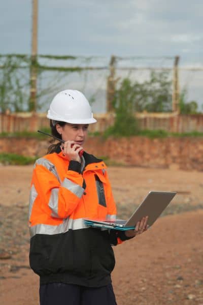 Uav survey backup workflow - ALTA SURVEY Kentucky Survey professional using laptop and communication tools on site as part of UAV survey backup workflow