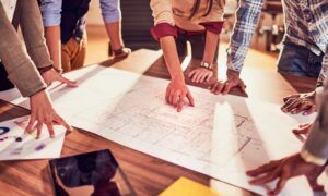 Community planning map review meeting - ALTA SURVEY Kentucky Community planning team reviewing land use maps that guide land surveying decisions