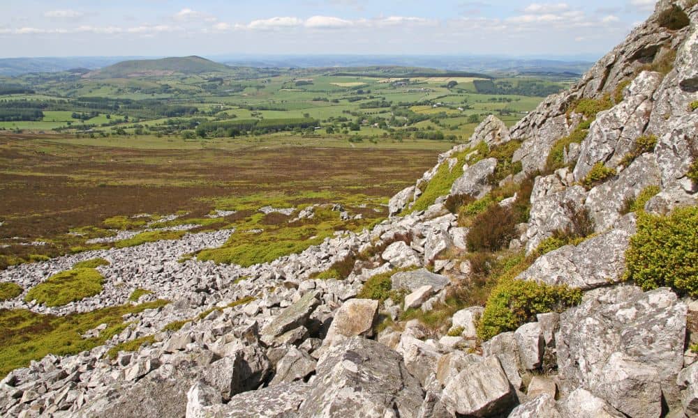 Rocky hillside landscape showing steep slopes and elevation changes that topo surveys help measure for better landslide risk awareness