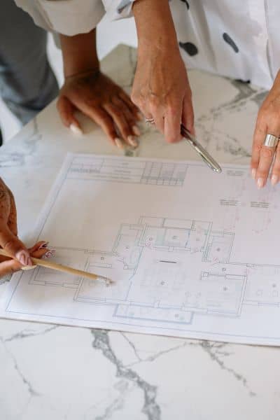 Reviewing property plans and documents for an alta land survey
